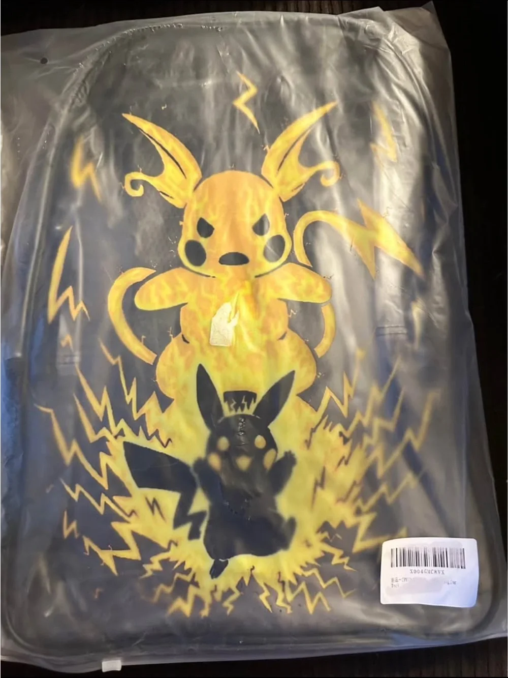Black Backpack with Yellow Electric Pikachu Graphic